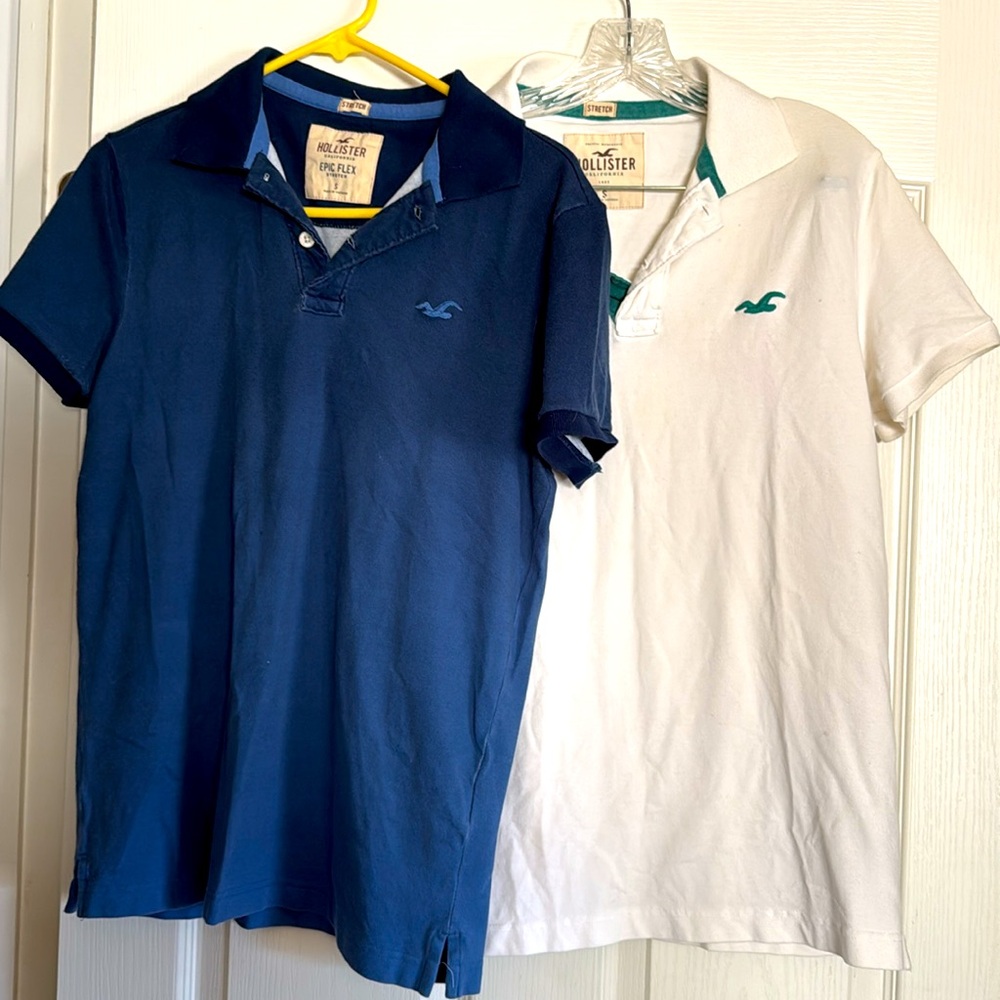 Two men’s Hollister polo style shirts blue and white